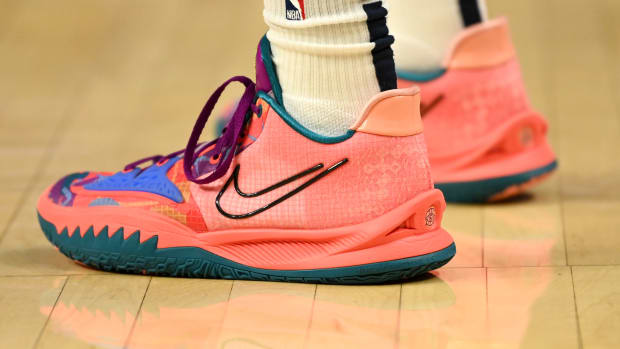 Ja Morant wearing the Nike Kyrie Low 4 '1 World 1 People'.